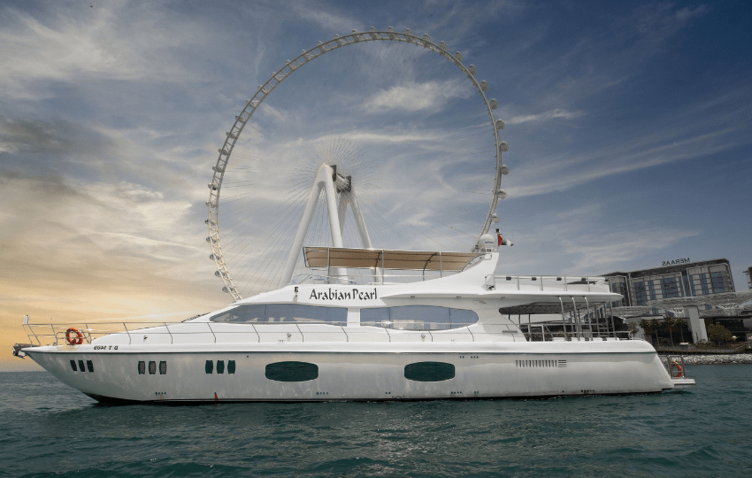 Person enjoying a scenic yacht tour on the open water